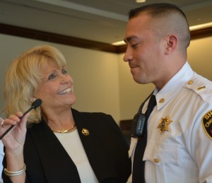 Chester County Sheriff Carolyn “Bunny” Welsh (left) congratulates Lt. Jason Suydam on his promotion.