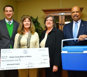 Commissioners Chairman Ryan Costello (from left), Meals on Wheels Director Jeani Purcell, Commissioner Kathi Cozzone, and Commissioner Terence Farrell display the ceremonial check for $10,000.