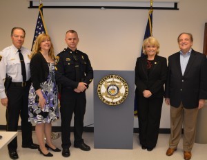 Chester County Chief Deputy George P. March (from left), Patty Hansen, Cpl. Kurt Hansen, Sheriff Carolyn “Bunny” Welsh, and State Sen. Andy Dinniman appear at the ceremony honored Hansen.