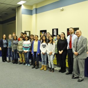 The Downingtown Middle School Future Cities team receives recognition from the school board.