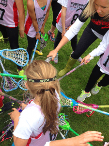  The 3-4 team of girls, led by coaches Melissa O’Hara and Heidi Williams put all of their sticks in to cheer on their team for a great game. Credit Coatesville Youth Lacrosse 