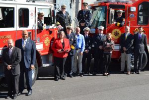 (From left to right, front row) Robert Kagel, Director, Chester County Department of Emergency Services; Chester County Commissioner Terence Farrell; County Commissioner Kathi Cozzone; Jack Law, West Bradford Fire Chief and Chester County Fire Chiefs Association; John Sly, John Sly Grantwriting; John Weer, Chester County Fire Marshal; B.J. Meadowcroft, Union Fire Company of Oxford; County Commissioner Michelle Kichline, Beau Crowding, Deputy Director of Fire Services, Chester County Department of Emergency Services; Congressman Ryan Costello; (from left to right, back row) Mike Holmes, Chief, Lionville Fire Company; Dave Jones, West Whiteland Fire Company; Ron Miller, President, Chester County Fire Police Association; and Steve Nuse, Chief, Po-Mar-Lin Fire Company. 